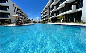 Flat em Muro Alto Porto de Galinhas com Piscina, Ar-condicionado e Cozinha Equipada